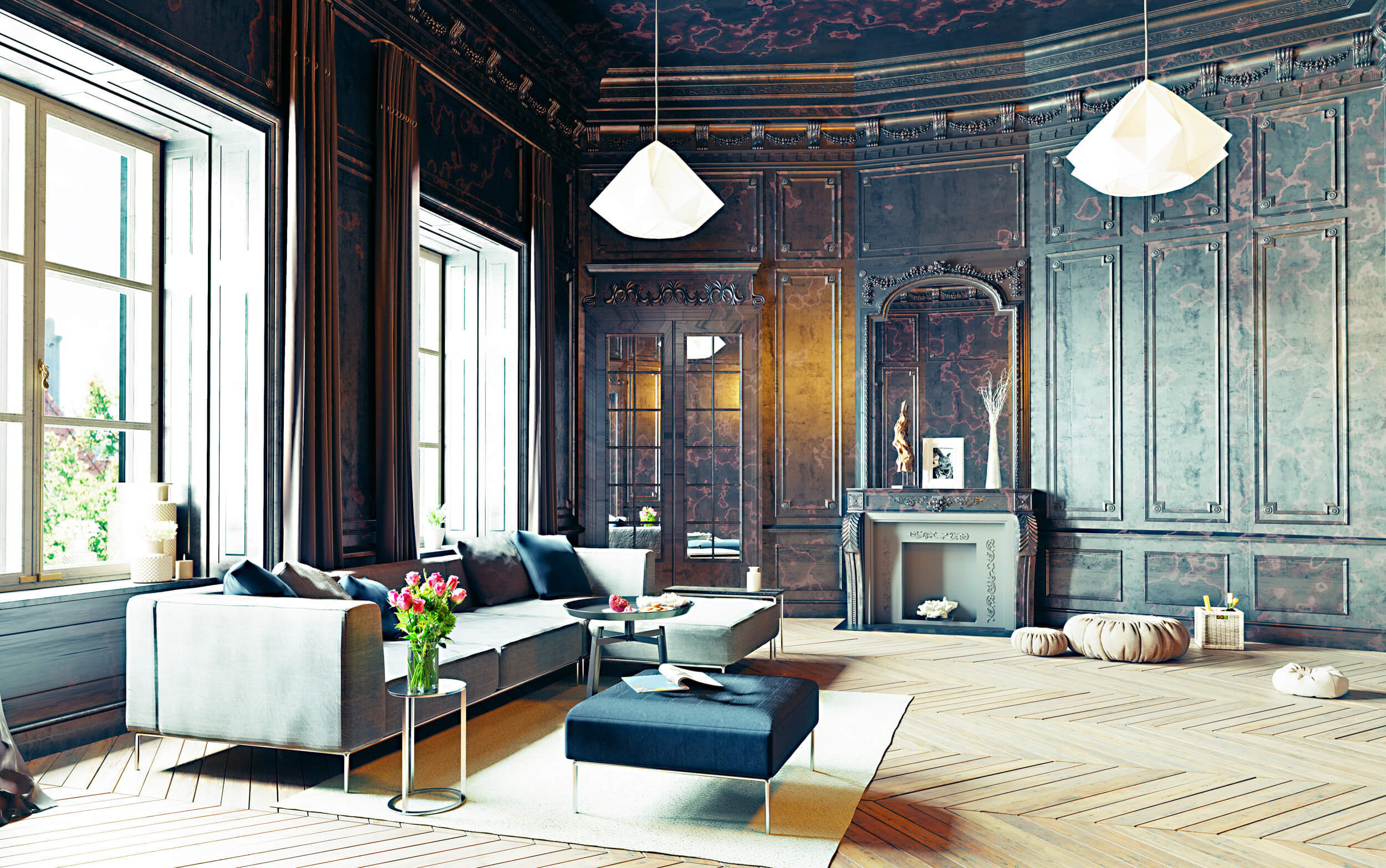 living room with dark wood panel walls, fireplace, gray sectional sofa, black square ottoman, chrome side table, round metal accent table, accent pouf ottomans, drapery, mirrored french doors, oversized pendant lights, area rug and herringbone hardwood floor