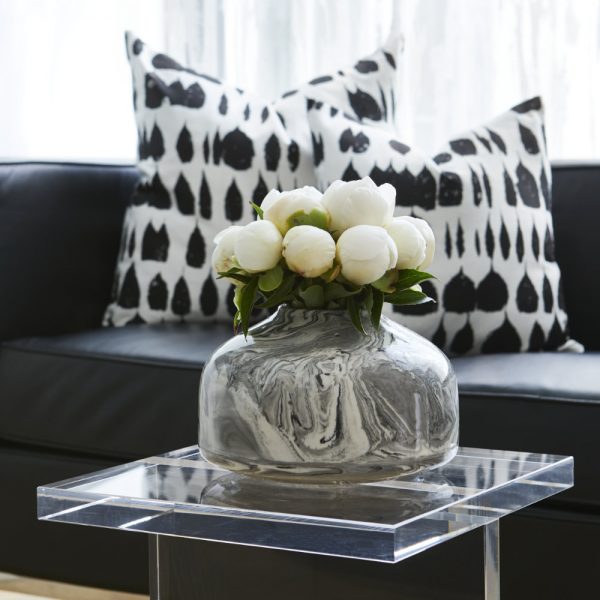 Toronto Interior Design Group, TIDG, TIDG boutique, decorative vase, white peonies, acrylic table, decorative pillows, black sofa, leather sofa