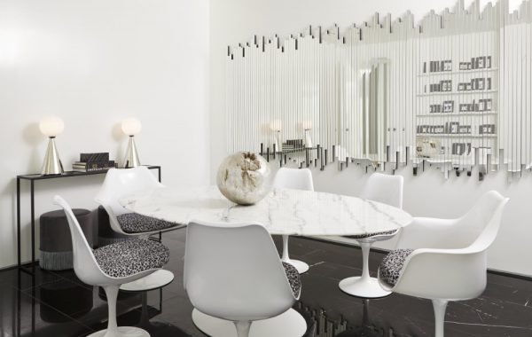 Toronto Interior Design Group, TIDG, TIDG boutique, marble table, decorative centre piece, tulip chairs, unique mirror, console, table lamps, black marble floor