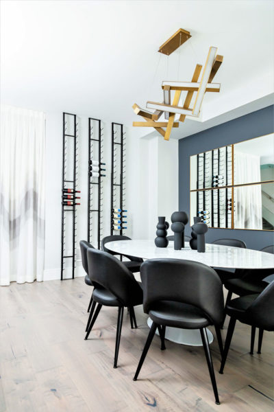 TIDG, Toronto Interior Design Group, Luxury, Boutique, Etobicoke, Dining Room, Leather Chairs, Marble Table, Wine Rack, Mirrors, Black Vases, Light Hardwood Floor